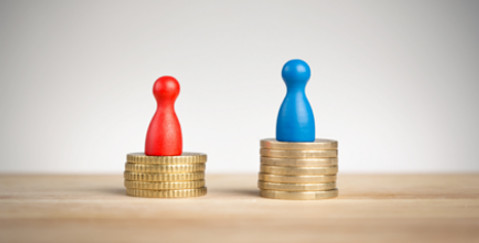 Gender Pay Gap FAQ - man on a taller stack of coins